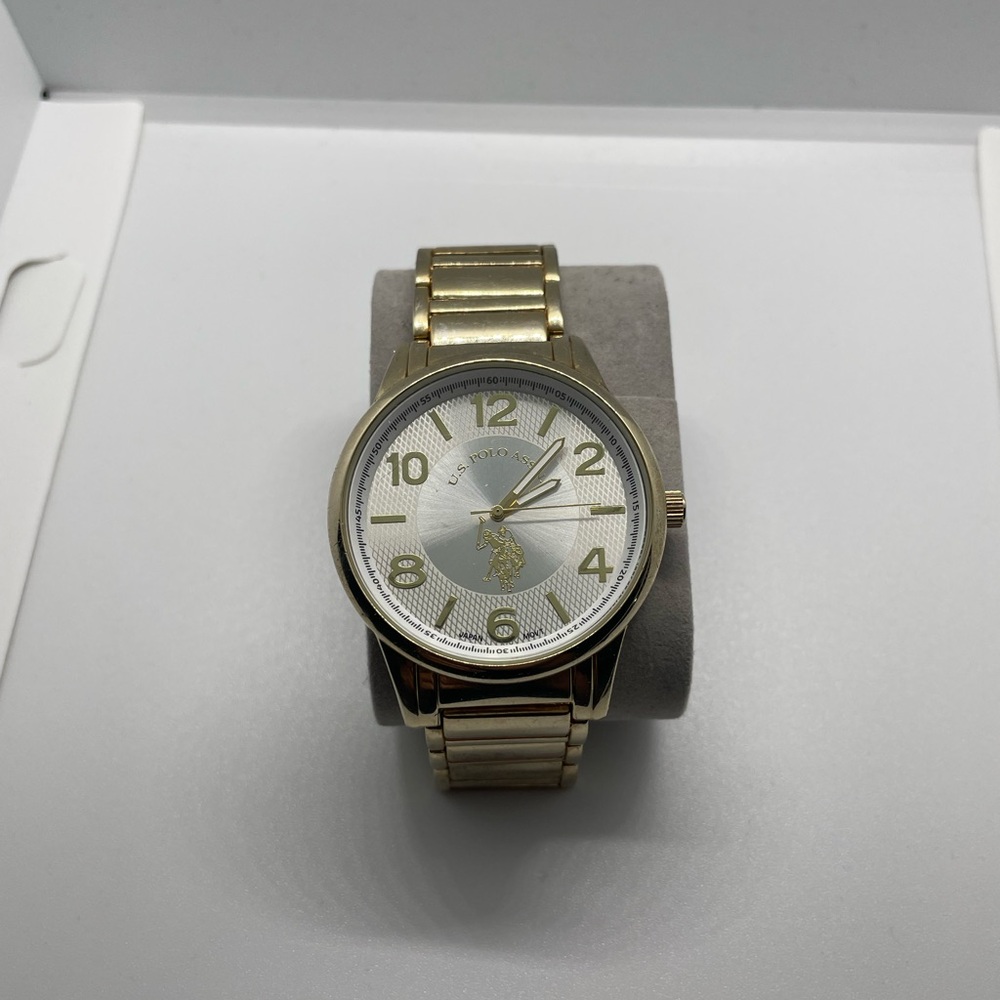 Gold polo watch